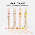 Adult Natural: four bamboo toothbrushes with orange, beige, pink and yellow bristles