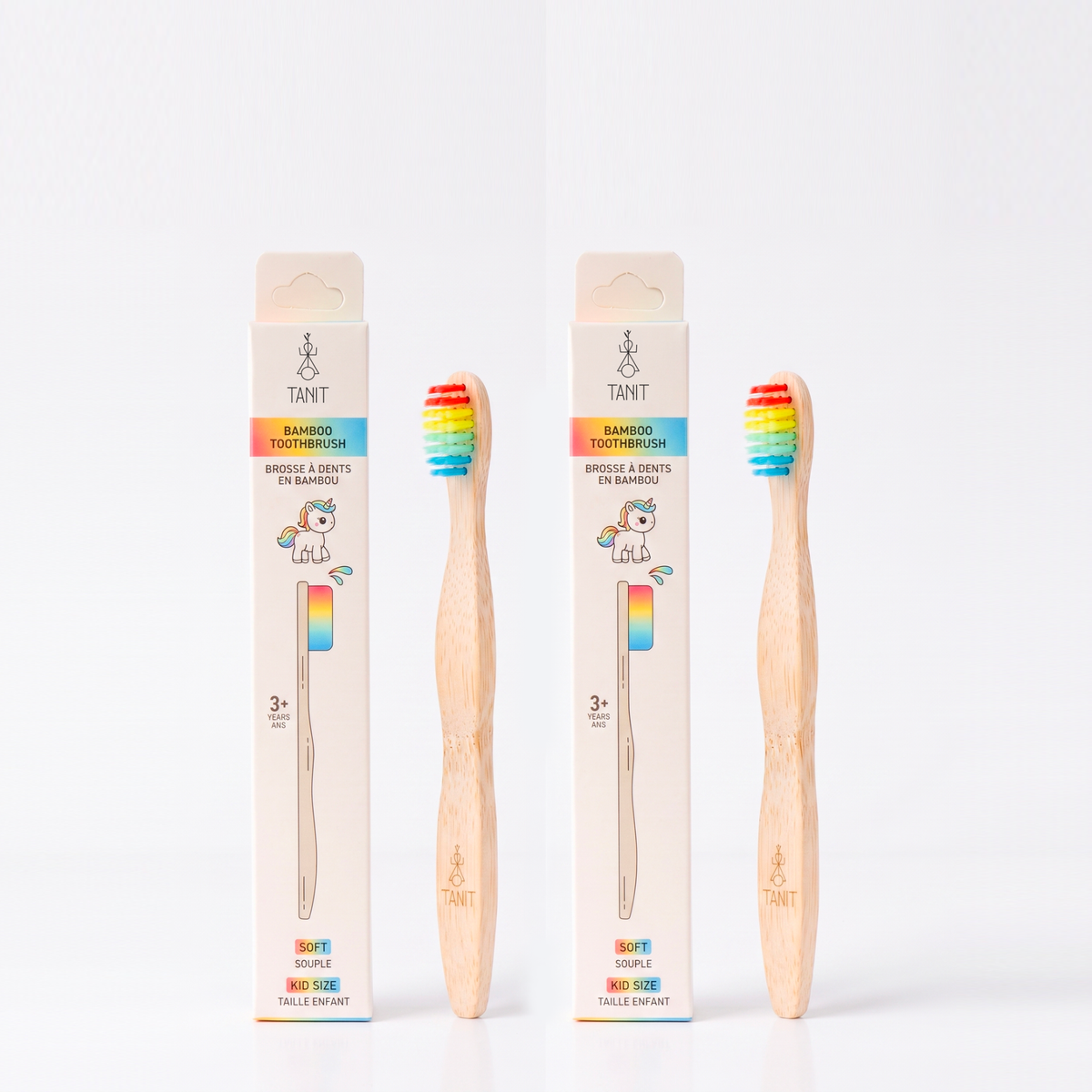 Two Rainbow kids bamboo toothbrushes with packaging