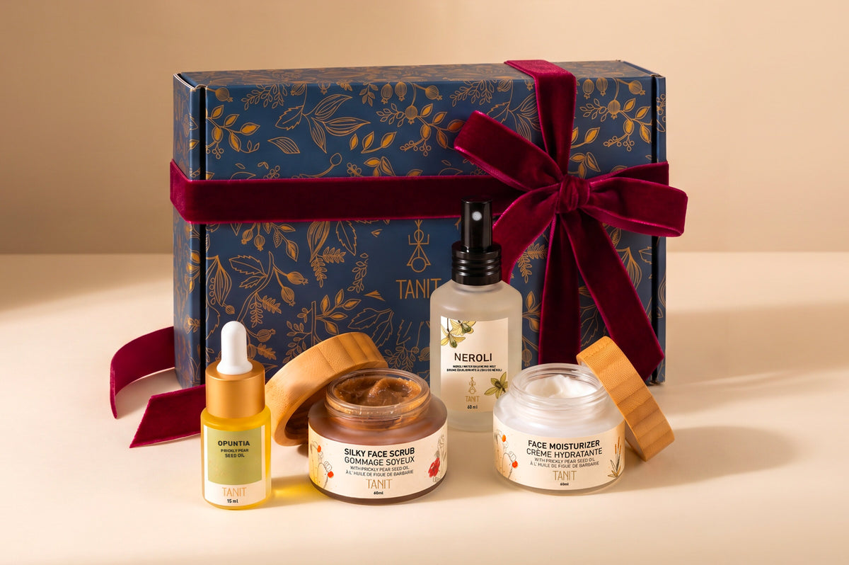 TANIT Neroli gift box tied with a burgundy velvet bow, with Opuntia oil, Silky Face Scrub, Face Moisturizer and Neroli mist